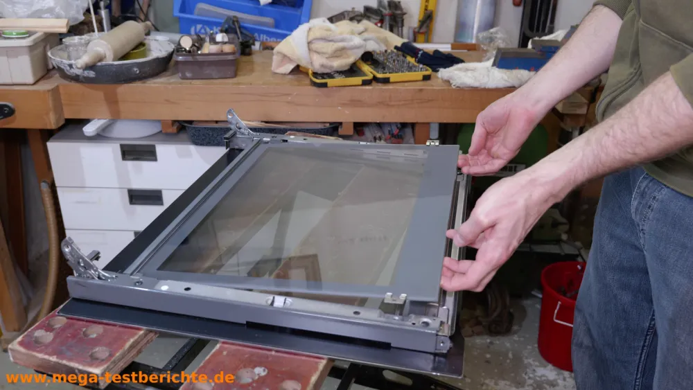 Ofentüre ausbauen - Scheibe richtig herum einlegen